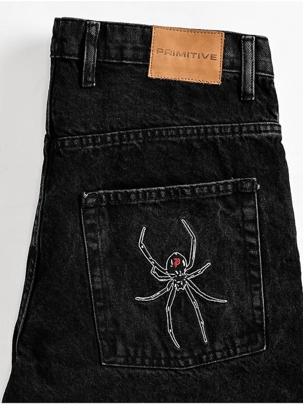 Primitive Black Relaxed Jeans with White Spider Embroidery and Tan Patch